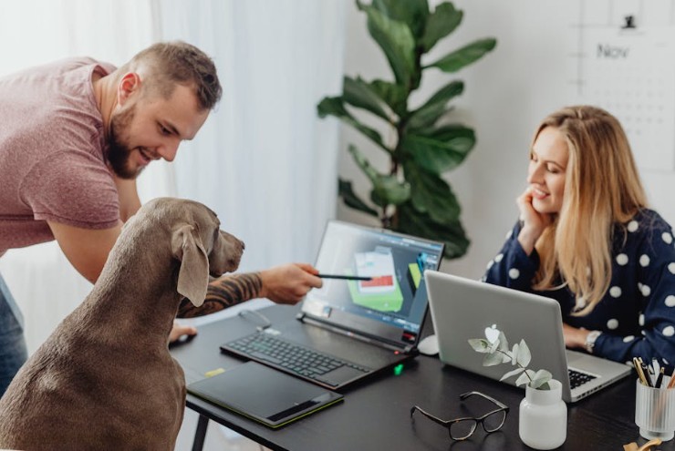 Why Pet-Safe Outdoor Spaces Make Apartments and Condos More Pet-Welcoming and Desirable to Renters like this couple looking to rent an apt or buy a condo
